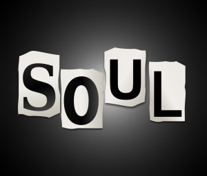 Illustration depicting a set of cut out printed letters arranged to form the word soul.