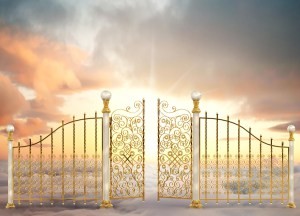 Pearly gates of heaven opening to a high altitude sunrise between two layers of clouds in a landscape orientation